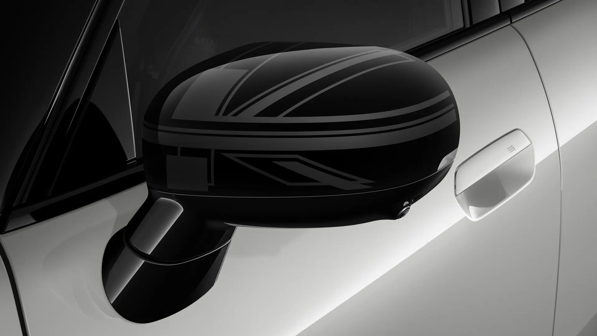 MINI Cooper 3 portes en argent avec coques de rétroviseurs extérieurs au design Night Union Jack.