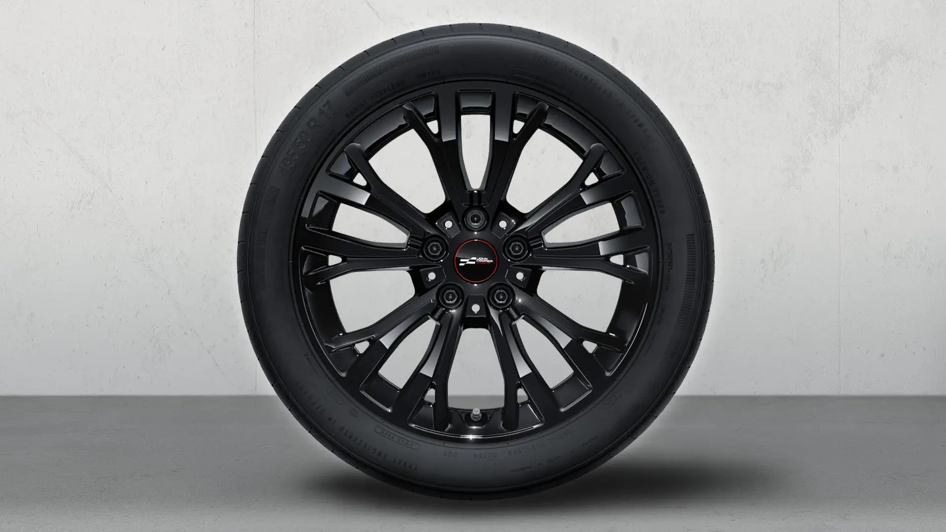 17" John Cooper Works Leichtmetallrad Star Spoke 962 als Winterkomplettrad in Jet Black.